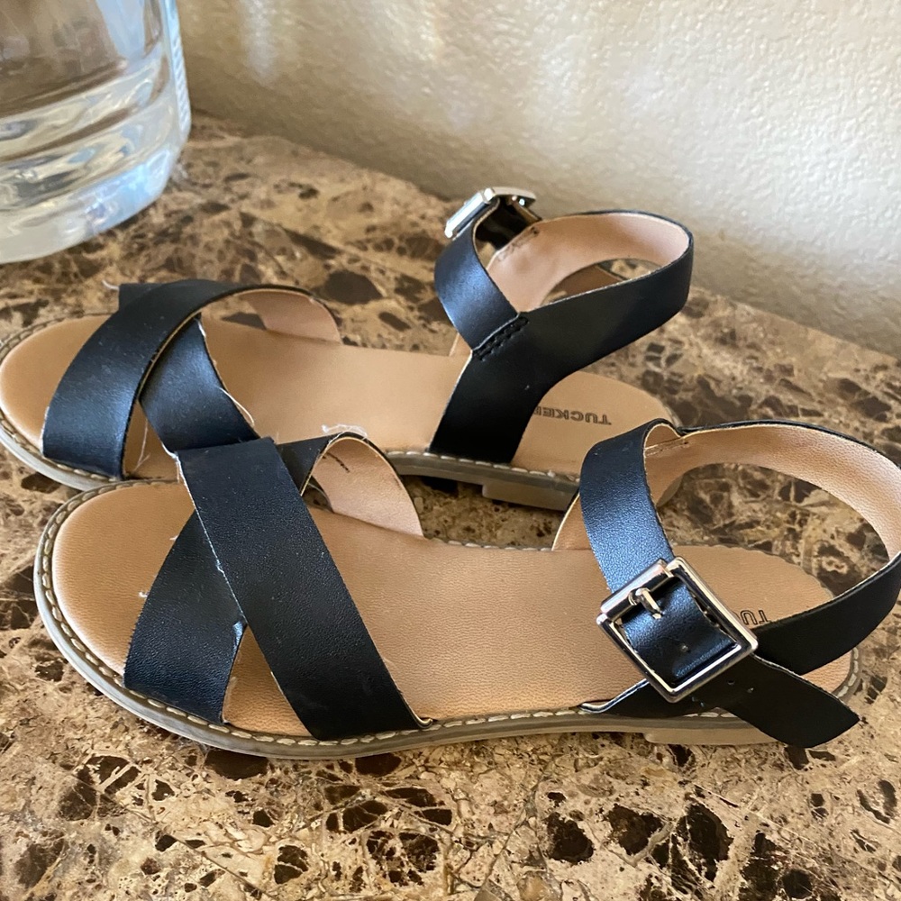 Super cute sandals. Worn three or four times only.